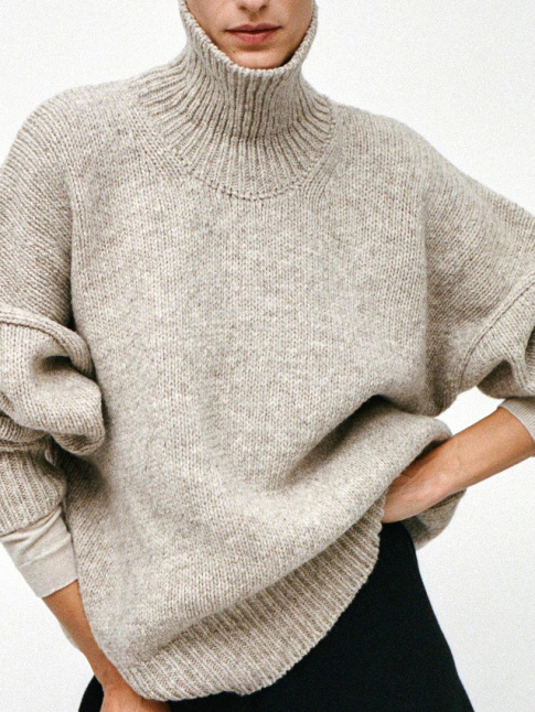 Mlant col droul ayant de la tenue et manches gnreusement descendues, ce pull a a tout bon !
