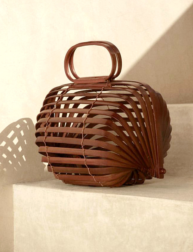 Oui au sac � main permettant de promener �l�gamment notre canari !